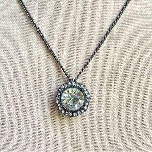 Givenchy gunmetal pendant necklace with clear rhinestones in octagonal setting